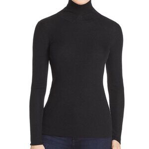Jade Turtleneck Ribbed Merino Wool Sweater with Bow Collar Detail